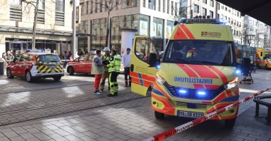 Emergency services and police stand at Paradeplatz in Mannheim, Germany, March 3, 2025. (AP Photo)