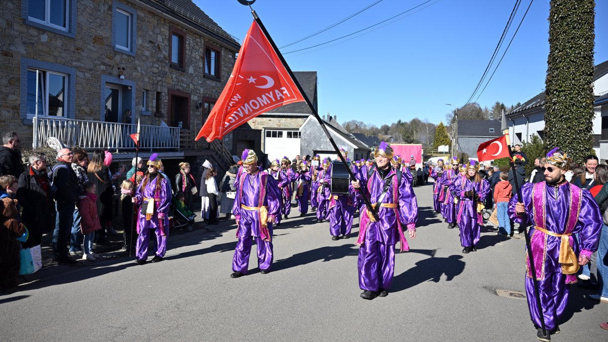 People celebrate the annual traditional carnival in  a village known as the “Turkish village,&quot; Faymonville, Belgium, March 3, 2025. (AA Photo)