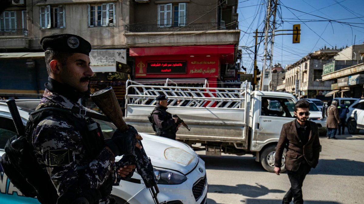 YPG members patrol a street, Qamishli, Syria, Feb. 26, 2025. (AFP Photo)