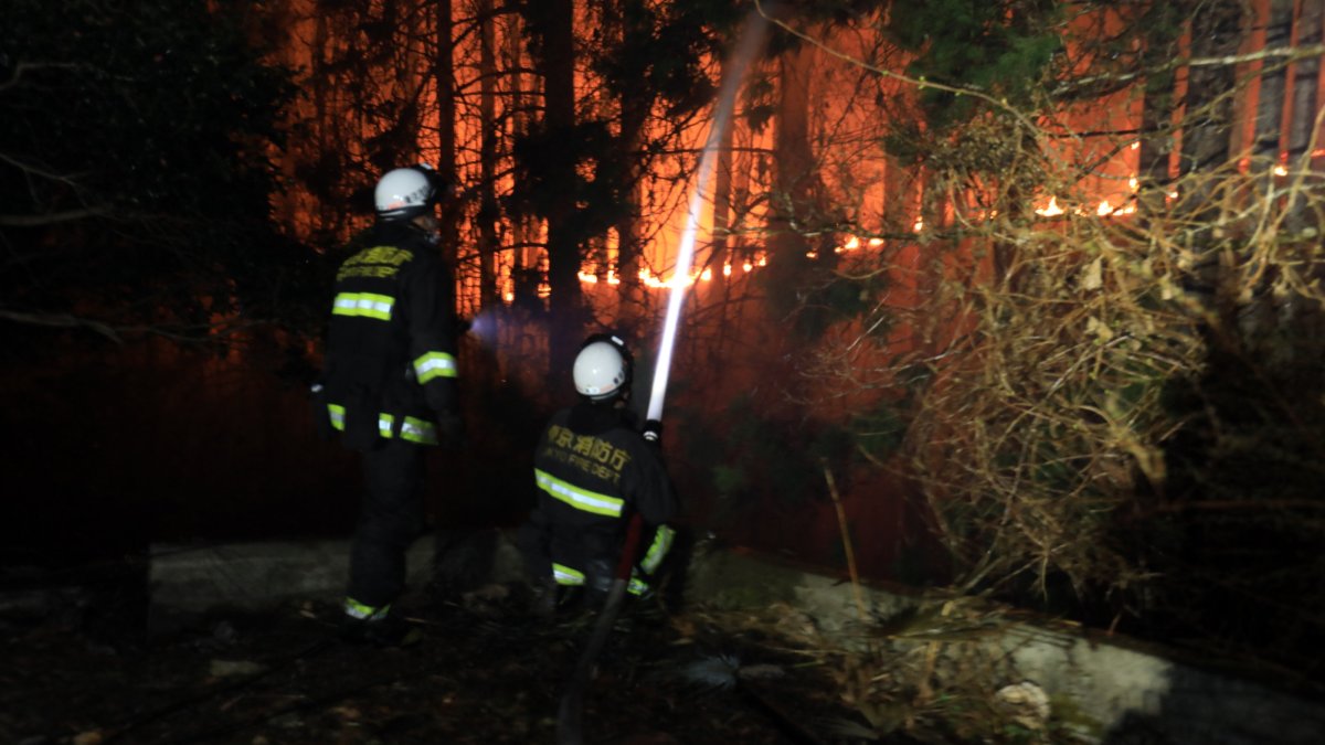 Firefighters battling a wildfire, Iwate prefecture, northeastern, Ofunato, Japan, March 4, 2025. (Fire and Disaster Management Agency via EPA Photo)