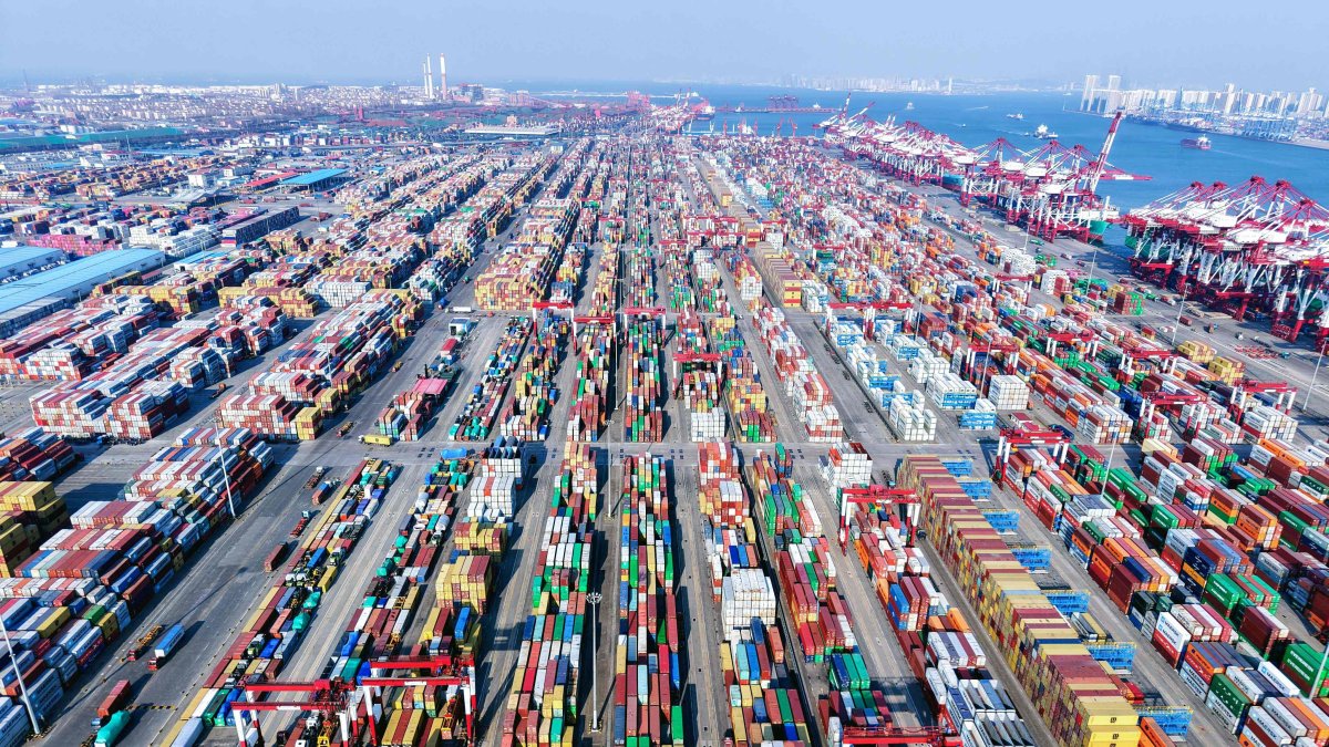 An aerial view shows rows of containers at Qingdao port in China’s eastern Shandong province, Feb. 23, 2025. (AFP Photo)