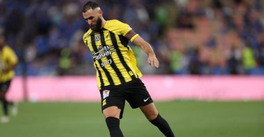 Al-Ittihad&#039;s Karim Benzema runs with the ball during the Saudi Pro League football match between Al-Ittihad and Al-Hilal at King Abdullah Sports City, Jeddah, Spain, Feb. 22, 2025. (AFP Photo)