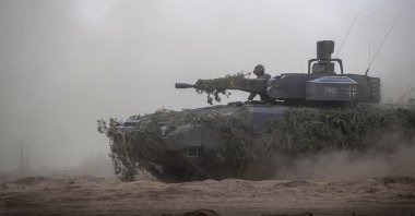 A German army Main battle tank Leopard 2A7V takes part in the Lithuanian-German division-level international military exercise 'Grand Quadriga 2024' at a training range in Pabrade, north of the capital Vilnius, Lithuania, May 29, 2024. (AP Photo)