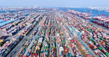 An aerial view shows rows of containers at Qingdao port in China’s eastern Shandong province, Feb. 23, 2025. (AFP Photo)