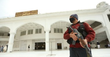 Pakistani police stands guard at the Darul Uloom Haqqania seminary following a bomb blast in Akora Khattak, Nowshera district, Khyber-Pakhtunkhwa province, Pakistan, Feb. 28, 2025. (EPA File Photo)