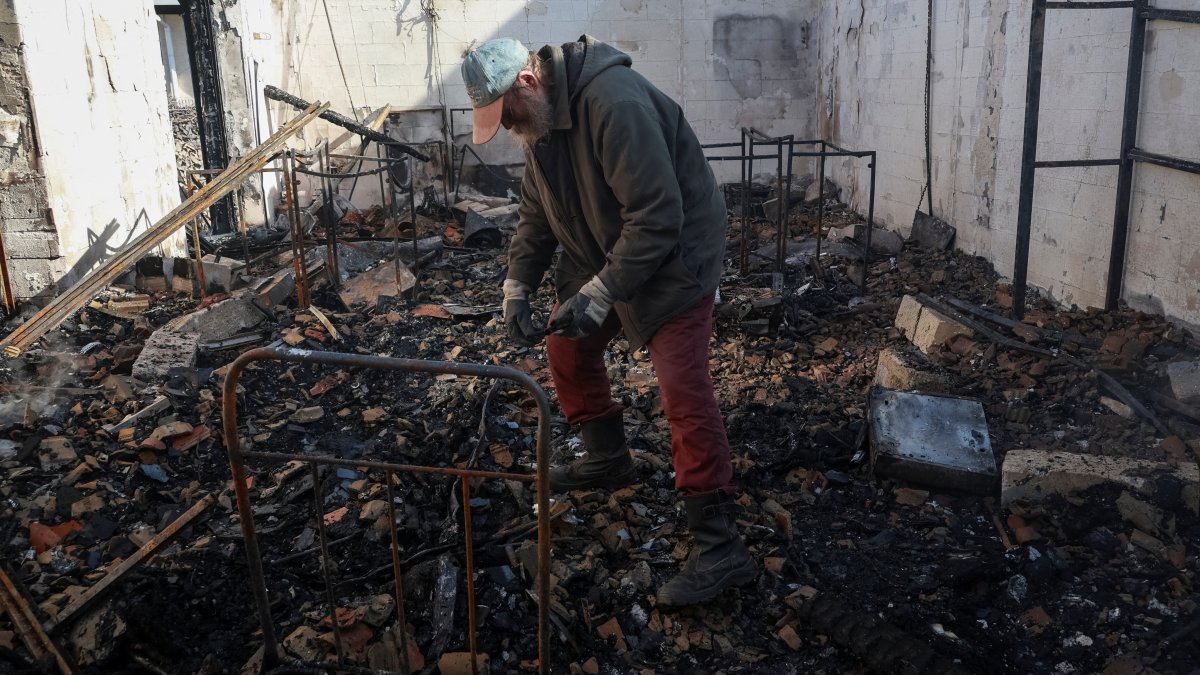 A resident stands inside the house destroyed by a Russian drone strike, amid Russia's attack on Ukraine, in Odesa, Ukraine March 5, 2025. (Reuters Photo)