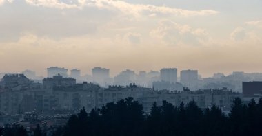 An aerial view of buildings enveloped by smog, Antalya, Türkiye, March 5, 2025. (DHA Photo)