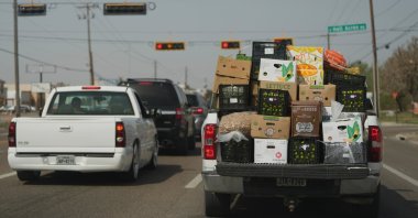 A truck loaded with produce from Mexico and Canada passes through Pharr, Texas, U.S., March 4, 2025. (AP Photo)