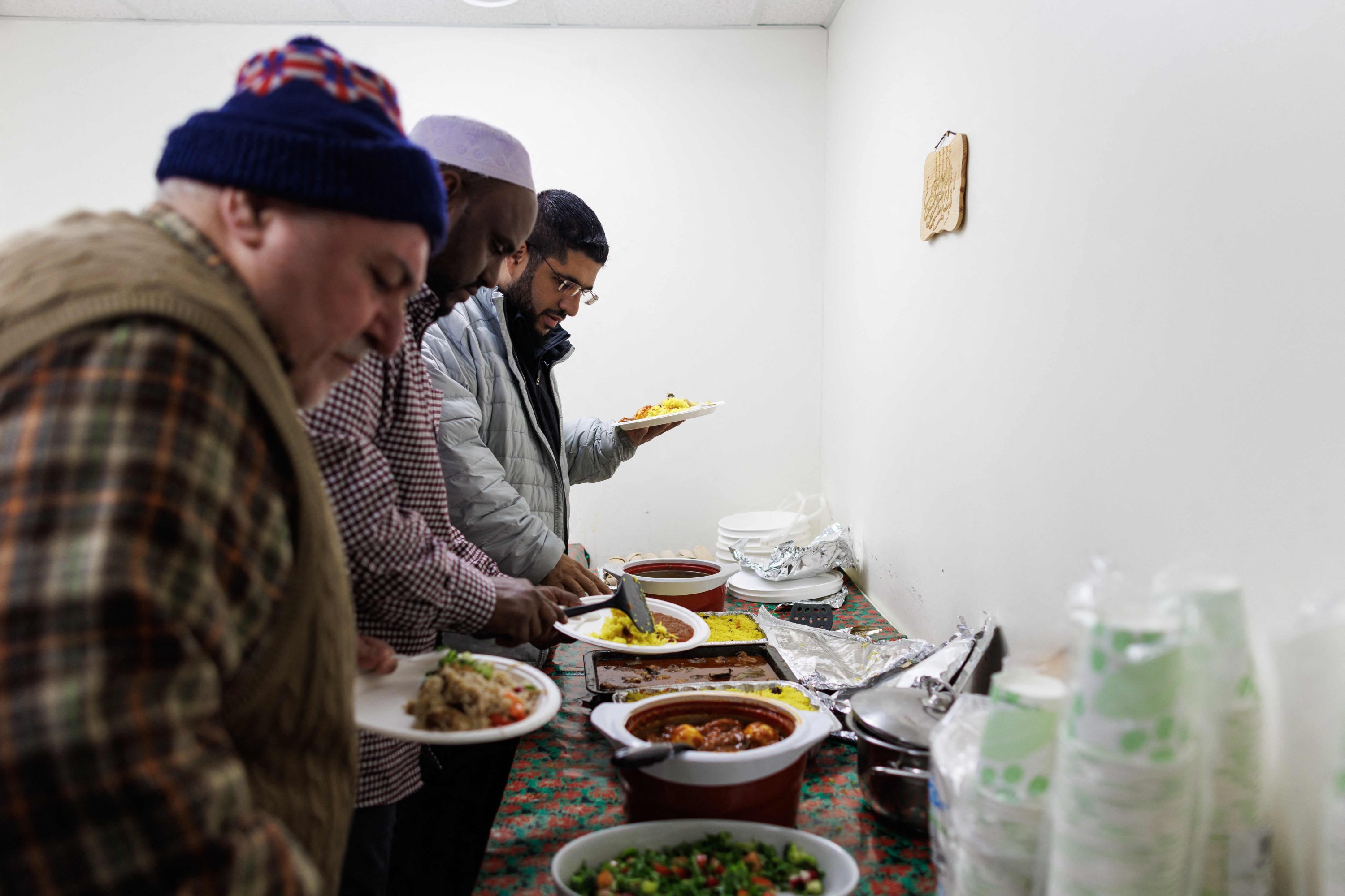 Devotees break their fast during Iftar at the Midnight Sun Mosque during Ramadan, Inuvik, Canada, March 2, 2025. (AFP Photo)