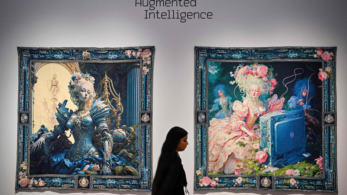 A person walks past AI artwork created by Grimes, Mac Boucher, Mary Jacobo and Eurypheus in New York City, U.S., Feb. 20, 2025. (AFP Photo)