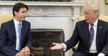 U.S. President Donald Trump and Canadian Prime Minister Justin Trudeau meet in the Oval Office of the White House in Washington, D.C., Feb. 13, 2017. (AFP File Photo)