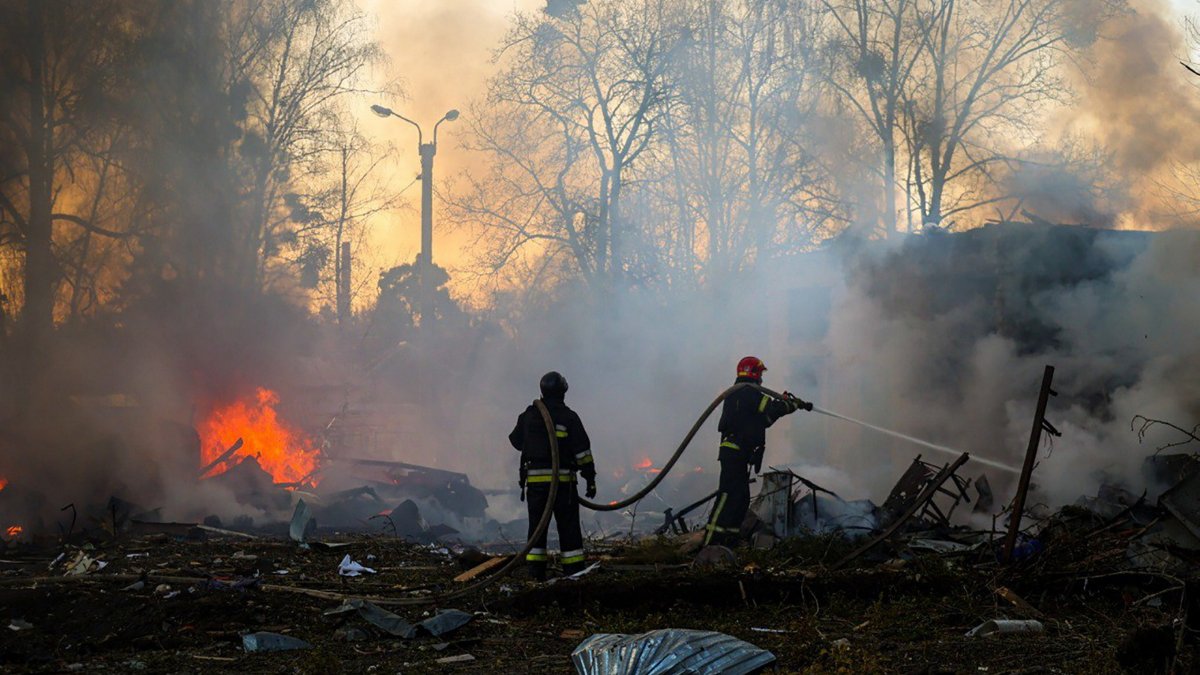 Rescuers work at the scene after Russian shelling hit Kharkiv, northeastern Ukraine, March 7, 2025. (EPA Photo)