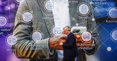 A man walks at the 2025 Mobile World Congress (MWC) in Barcelona, Spain, March 4, 2025. (Reuters Photo)