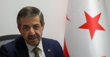 Turkish Republic of Northern Cyprus (TRNC) Foreign Minister Tahsin Ertuğruloğlu speaks to reporters, TRNC, Oct. 10, 2021. (AA Photo)