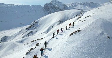 Skiers explore the slopes of Hakkari&#039;s high-altitude mountains, Türkiye, March 6, 2025. (AA Photo)