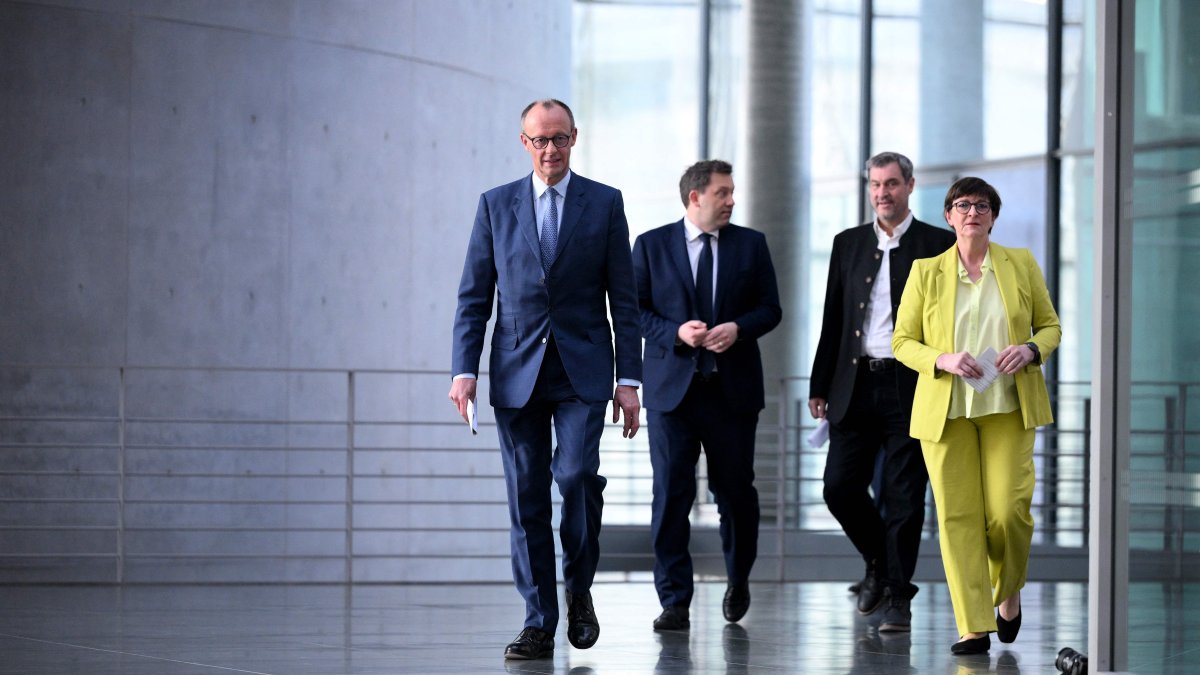 The leader of Germany&#039;s Christian Democratic Union (CDU) party Friedrich Merz (L), the co-leaders of Germany&#039;s social democratic SPD party Saskia Esken (R) and Lars Klingbeil (2nd L) and the leader of the conservative Christian Social Union (CSU) Markus Soeder (2nd R) arrive to give a statement on forming a future government coalition, Berlin, Germany, March 8, 2025. (AFP Photo)