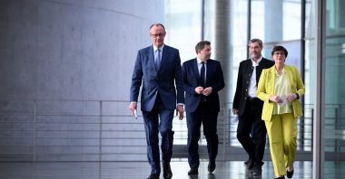 The leader of Germany&#039;s Christian Democratic Union (CDU) party Friedrich Merz (L), the co-leaders of Germany&#039;s social democratic SPD party Saskia Esken (R) and Lars Klingbeil (2nd L) and the leader of the conservative Christian Social Union (CSU) Markus Soeder (2nd R) arrive to give a statement on forming a future government coalition, Berlin, Germany, March 8, 2025. (AFP Photo)