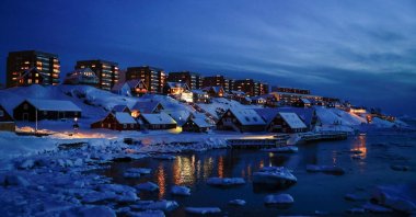 Houses light up Nuuk&#039;s old harbor, Greenland, Feb. 10, 2025. (Reuters Photo)