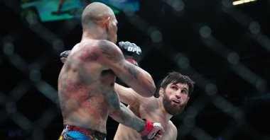Alex Pereira (L) fights Magomed Ankalaev during UFC 313 at Las Vegas, Nevada, U.S., Mar 8, 2025. (Reuters Photo) 