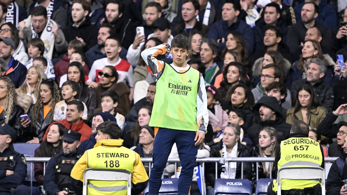 Real Madrid&#039;s Arda Güler watches from the sidelines during the La Liga match against Rayo Vallecano at the Santiago Bernabeu, Madrid, Spain, March 9, 2025. (AA Photo)