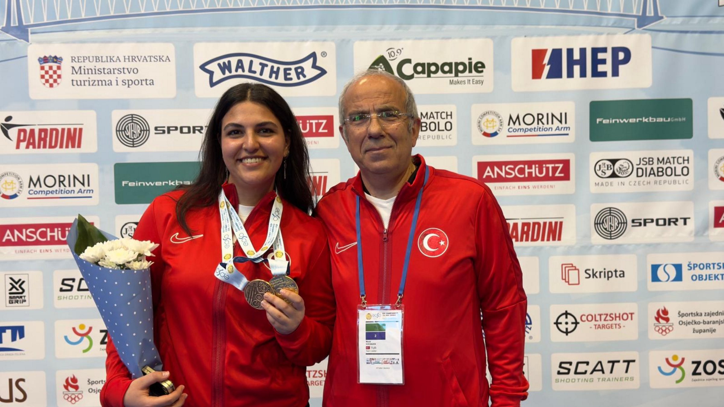 Türkiye&#039;s Şevval İlayda Tarhan shows off her European Championship women’s 10-meter air pistol final gold medal, Osijek, Croatia, March 9, 2024. (AA Photo)
