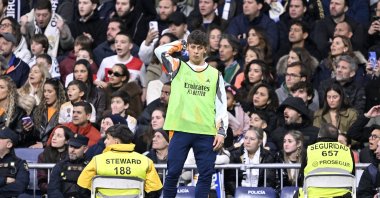Real Madrid&#039;s Arda Güler watches from the sidelines during the La Liga match against Rayo Vallecano at the Santiago Bernabeu, Madrid, Spain, March 9, 2025. (AA Photo)