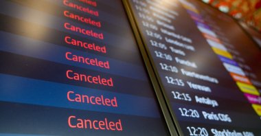 A display showing canceled flights due to a strike of German union Verdi is pictured at the Berlin-Brandenburg Airport, southeast of Berlin, Germany, March 10, 2025. (AFP Photo)