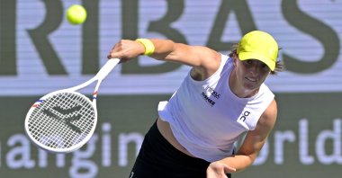 Poland&#039;s Iga Swiatek serves the ball as she defeats Dayana Yastremska in the third round of the BNP Paribas Open at the Indian Well Tennis Garden, Indian Wells, U.S., March 9, 2025. (Reuters Photo)