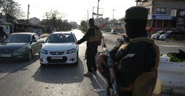 Members of the Syrian security forces stop vehicles at a checkpoint following clashes between government forces and supporters of the former Syrian regime, in Jableh town of Latakia, Syria, March 9, 2025. (EPA Photo)