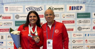 Türkiye&#039;s Şevval İlayda Tarhan shows off her European Championship women’s 10-meter air pistol final gold medal, Osijek, Croatia, March 9, 2024. (AA Photo)