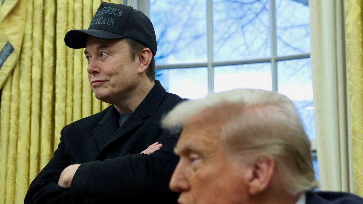 Elon Musk listens to U.S. President Donald Trump speak in the Oval Office of the White House, Washington, U.S., Feb. 11, 2025. (Reuters Photo)