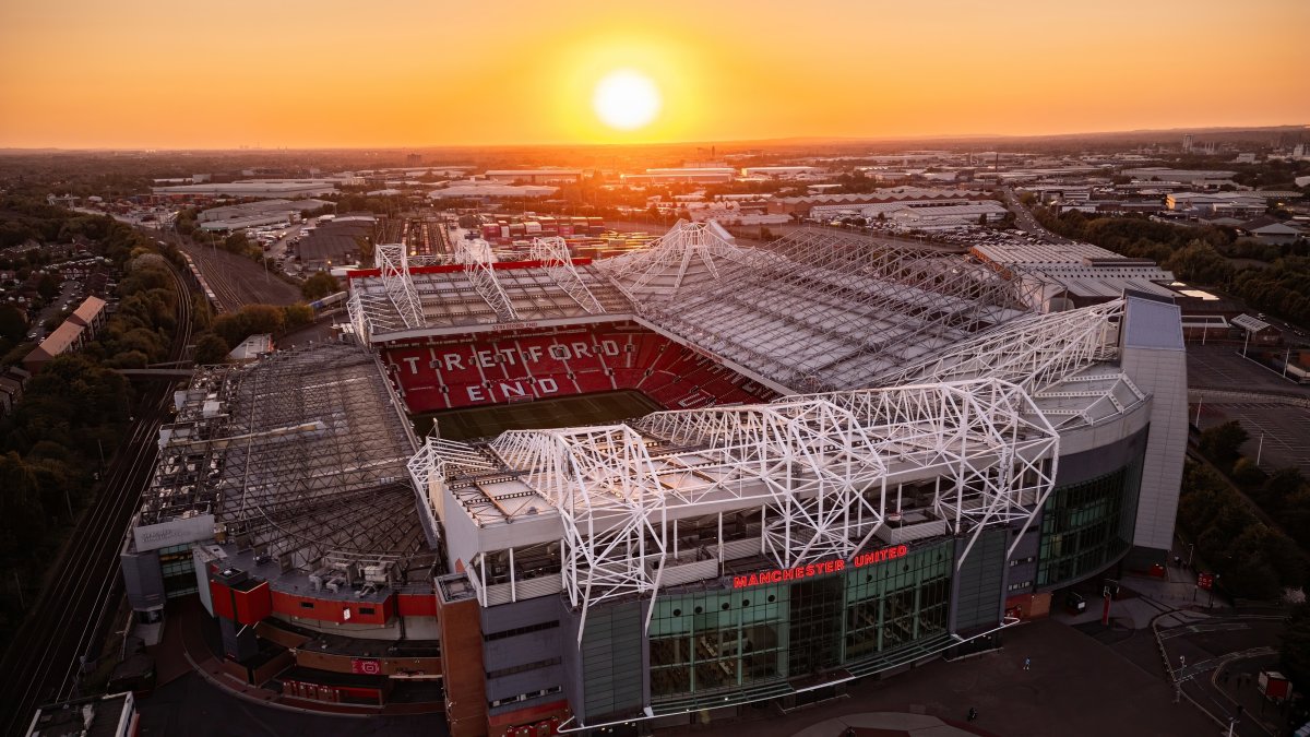 An aerial drone view of Manchester United Football Club Old Trafford Stadium at sunset, Manchester, U.K., Sept. 22, 2024. (Shutterstock Photo)