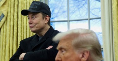 Elon Musk listens to U.S. President Donald Trump speak in the Oval Office of the White House, Washington, U.S., Feb. 11, 2025. (Reuters Photo)