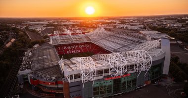 An aerial drone view of Manchester United Football Club Old Trafford Stadium at sunset, Manchester, U.K., Sept. 22, 2024. (Shutterstock Photo)