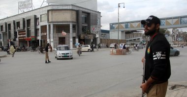 Pakistani security officials inspect vehicles at a checkpoint after security measures were heightened following a suspected militant attack on a passenger train in Sibi, in Quetta, the provincial capital of restive Balochistan province, Pakistan, March 11, 2025. (EPA Photo)