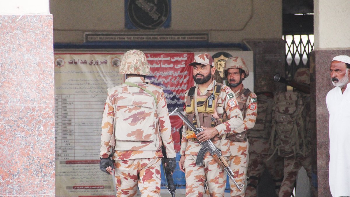 Pakistani security officials secure the Quetta Railway Station after all train services were suspended following an attack by militants on the Peshawar-bound Jaffar Express train in Quetta, Balochistan, Pakistan, March 12, 2025. (EPA Photo)