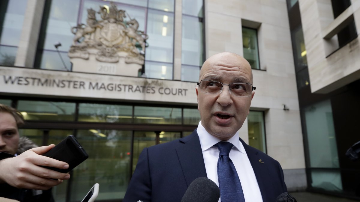 Akın Ipek, a prominent member of FETÖ, speaks to media as he leaves Westminster Magistrates Court after his extradition hearing was dismissed, London, U.K., Nov. 28, 2018. (AP Photo)