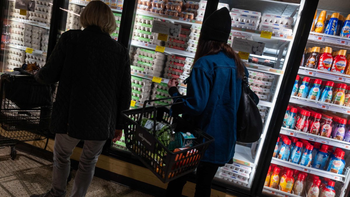 People look at eggs in a Manhattan grocery store in New York City, U.S., Feb. 25, 2025. (AFP Photo)