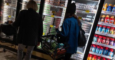 People look at eggs in a Manhattan grocery store in New York City, U.S., Feb. 25, 2025. (AFP Photo)