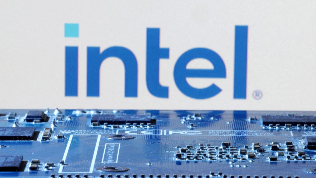 The Intel logo is seen near the computer motherboard in this illustration taken Jan. 8, 2024. (Reuters Photo)