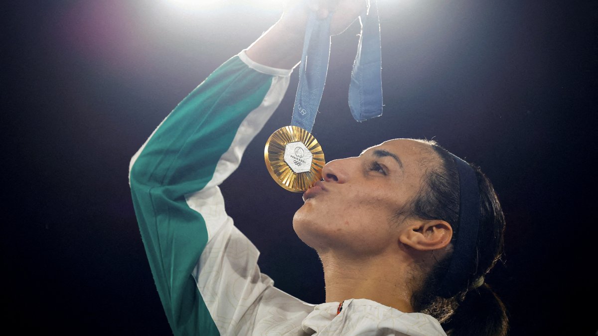 Gold medallist Imane Khelif of Algeria kisses her medal during the Paris 2024 Olympics victory ceremony at the Roland-Garros Stadium, Paris, France, Aug. 9, 2024. (Reuters Photo)