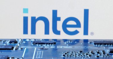 The Intel logo is seen near the computer motherboard in this illustration taken Jan. 8, 2024. (Reuters Photo)