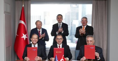 Energy and Natural Resources Minister Alparslan Bayraktar (2nd row C) and officials of the Turkish Petroleum Corporation (TPAO), TransAtlantic Petroleum and Continental Resources sign a joint venture agreement, Houston, U.S.,  March 12, 2025. (AA Photo)