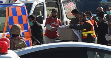 Volunteers carry the coffin of a Pakistani soldier killed by armed militants who ambushed a train in the remote mountainous area of southwestern Balochistan province, Pakistan, March 13, 2025. (AFP Photo)