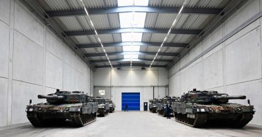 Leopard 2 tanks are pictured at a production line of German weapons maker Rheinmetall, Unterluess, Germany, Feb. 12, 2024. (AFP Photo)