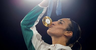 Gold medallist Imane Khelif of Algeria kisses her medal during the Paris 2024 Olympics victory ceremony at the Roland-Garros Stadium, Paris, France, Aug. 9, 2024. (Reuters Photo)