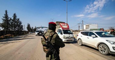 YPG members patrol a street in Qamishli, Syria, Feb. 26, 2025. (AFP Photo)