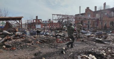 Russian soldiers operate among destruction in the town of Sudzha in the Kursk region, Russia, March 13, 2025. (AFP Photo)