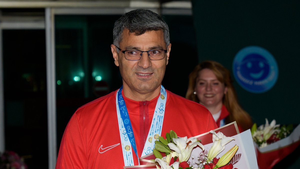 Veteran Turkish shooter Yusuf Dikeç arrives at the Esenboğa Airport after the European Shooting Championship, Ankara, Türkiye, March 13, 2025. (AA Photo)