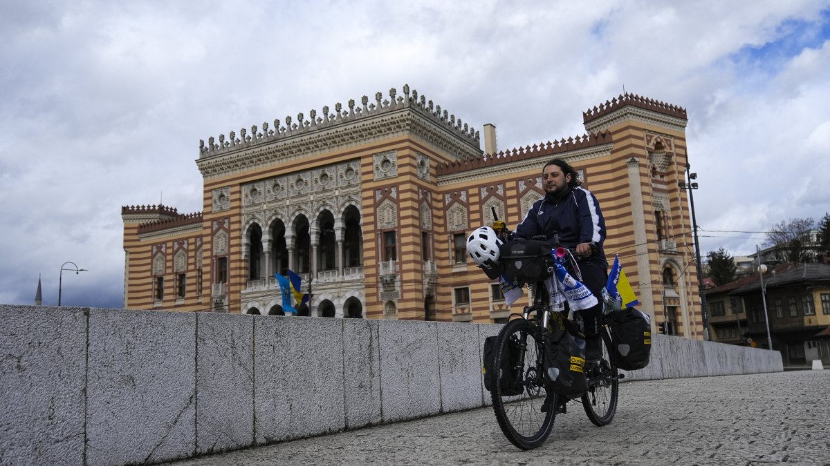 Turkish cyclist explores historic streets while passing through on his Hajj journey, Sarajevo, Bosnia-Herzegovina., March 13. 2025. (AA Photo)